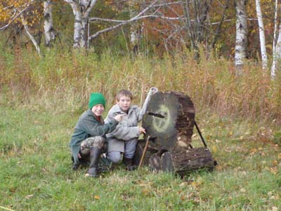Two young guns showing off their newly acquired throwing skills.