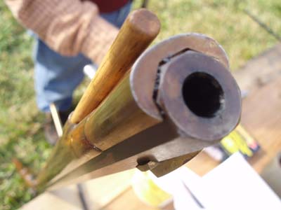 The muzzle end of a 36 caliber long gun.